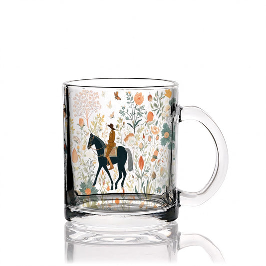 Clear glass mug with a horse and rider design on a white background