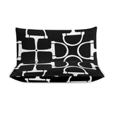Black pillowcase with white geometric pattern on a white background