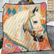 Colorful quilt with a horse design